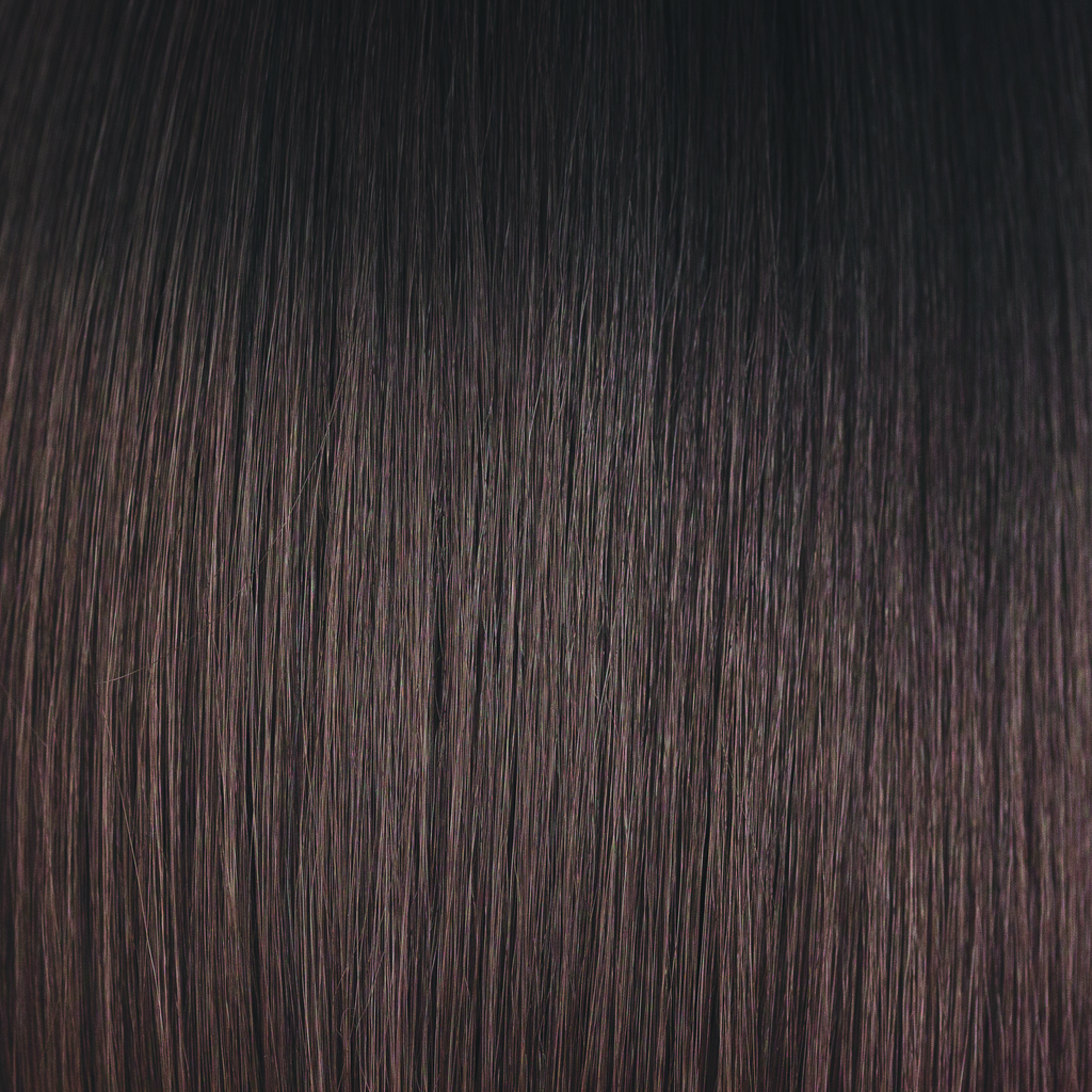 Hot Chocolate  -  An expensive looking color is a dark brown with a subtle blend of dark chocolate and milk chocolate tones, while maintaining a natural regrowth which keeps this color looking very realistic. Hot Chocolate is one of our high heat colors.